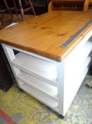 VINTAGE DRAPER'S PINE TOP TABLE with three under shelves, 84 x 122cms