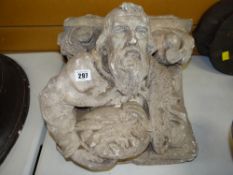 VICTORIAN PLASTER MAQUETTE OF A PILLAR CAP WITH CHRIST holding a basket of fish, 30 x 33cms
