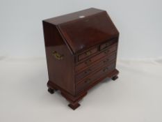 MAHOGANY MINIATURE BUREAU in the 18th Century-style on bracket feet and having three long and two