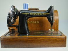 GOOD VINTAGE SINGER SIMANCO SEWING MACHINE number 94027 with polished domed case with ribbed handle,