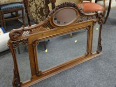 19TH CENTURY AMERICAN SALOON MIRROR BACK of carved and fretwork form and having four panels of