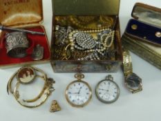 ITEMS ON A SHOEBOX LID including tin of costume jewellery, watches ETC, bangles, silver napkin