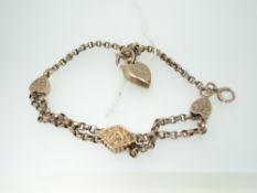 9CT YELLOW GOLD BRACELET having heart and lozenge attachments, 8.5gms