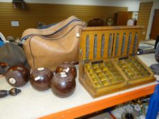 CASED SET OF FOUR TAYLOR ROLPH & CO. BIAS CROWN GREEN BOWLS together with a vintage shopkeepers coin