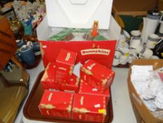 COLLECTION OF ROYAL DOULTON BUNNYKINS boxed figures for Henry & Wives ETC and boxed stand