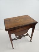 19TH CENTURY ROSEWOOD MARQUETRY GAMES TABLE having single compartmented drawer, slide-out basket,