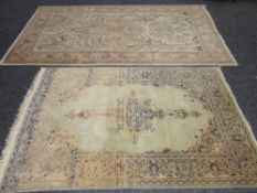 MAINLY FAWN GROUND PERSIAN WOOLEN RUG with centre floral pattern surrounded by birds and flowers and