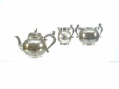 THREE-PIECE VICTORIAN SILVER BACHELOR TEASET each element of circular form having decorative figural