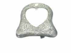 VICTORIAN SILVER TABLE MIRROR of easel form and having repousse floral decoration and bevelled heart