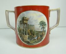 19TH CENTURY PRATT WARE POTTERY LOVING CUP decorated with opposing panels of Roman ruins, 14.25cms