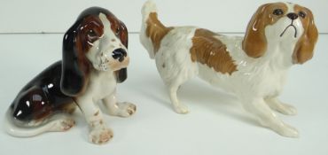ROYAL DOULTON PORCELAIN MODEL OF A KING CHARLES SPANIEL together with a Sylvac seated Basset-hound