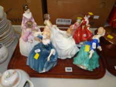 EIGHT ROYAL DOULTON FEMALE FIGURINES