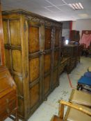 QUALITY ANTIQUE-REPRODUCTION BEDROOM SUITE comprising triple wardrobe, mirrored dressing table,