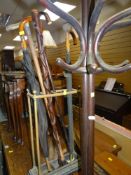 VINTAGE METAL STICK STAND AND CONTENTS, together with a half-circle hat and coat stand