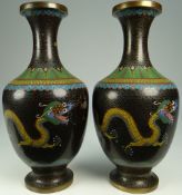 PAIR OF EARLY 20TH CENTURY CHINESE CLOISONNE VASES having narrow flared necks and pedestal bases,