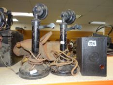 PAIR OF CANDLESTICK-TYPE EARLY 20TH CENTURY TELEPHONES model Tele No.150 (distressed), together with