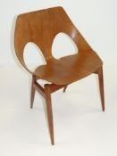 MID-CENTURY 'JASON' CHAIR BY CARL JACOBS FOR KANDY, in plywood, having shaped bent-wood tub-type