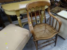 PAINTED REPRODUCTION SIDE TABLE, a vintage cane seated bent wood elbow chair and a modern footstool