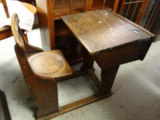 GOOD VINTAGE OAK SCHOOL DESK with folding seat and double inkwells