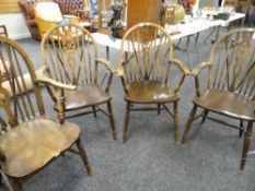 SET OF FOUR WHEEL BACK & SPINDLE BACK ARM CHAIRS