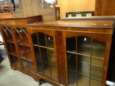 REPRODUCTION MAHOGANY BOOKCASE together with a vintage two-glass door display cabinet (2)