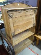 NEAT LIMED-OAK ART NOUVEAU-STYLE BUREAU with bookshelf base, retailed by P. E Gane of Newport