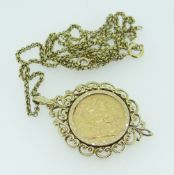 GOLD FULL SOVEREIGN IN 9CT MOUNT ON CHAIN dated 1908