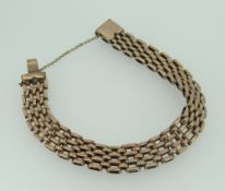 9CT YELLOW GOLD GATE BRACELET with safety chain, 18gms