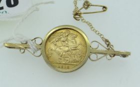 1912 GOLD HALF SOVEREIGN IN 9CT MOUNT