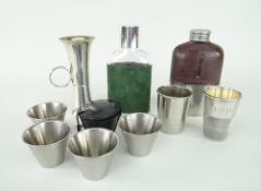 DRINKING COLLECTABLES including silver double-end spirit measure with loop handle, two hip flasks,