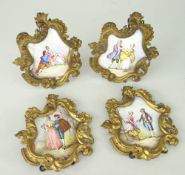 SET OF FOUR FRAMED ENAMEL PLAQUES depicting period figures in dress (4)