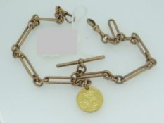 VICTORIAN GOLD FULL SOVEREIGN dated 1900, attached to a 9ct rose gold watch chain with T-bar,