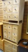 THREE MODERN LIGHT OAK NINE-DRAWER CD CABINETS