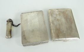 TWO VINTAGE CONTINENTAL SILVER CIGARETTE CASES having machine turned decoration, one with foliate