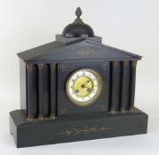 VICTORIAN BLACK SLATE ARCHITECTURAL MANTEL CLOCK of classical form with dome top and acorn finial,