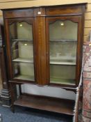 EDWARDIAN INLAID MAHOGANY DISPLAY CABINET with two glazed doors with swag style decoration, 160cms