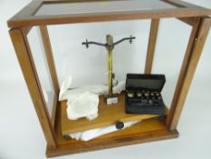 VINTAGE CASED CHEMICAL BALANCE WITH WEIGHTS bearing plaque 'Kernick & Son Ltd Laboratory Supplies,