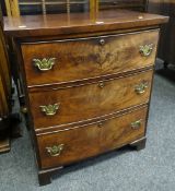 ANTIQUE MAHOGANY BOW FRONTED THREE DRAWER CHEST OF DRAWERS with brass fittings