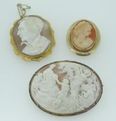 THREE ANTIQUE CAMEO BROOCHES to include an extensively carved mythological scene oval brooch with