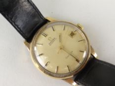 OMEGA AUTOMATIC GENTS WRISTWATCH with believed original black leather strap, the plain dial with