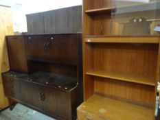 NARROW TEAK G-PLAN STANDING WALL UNIT with three-drawer base and glazed cupboard top, 198cms high