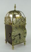 17TH CENTURY STYLE BRASS LANTERN CLOCK, circular dial with Roman numerals, floral engraved centre,