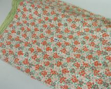 ANTIQUE WELSH QUILT with intricate floral repeat decoration, 197 x 146cms