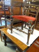 MID-CENTURY EXTENDING OAK DINING TABLE on cross-stretcher base together with a ladder-back chair and