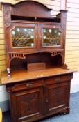 POSSIBLY GERMAN ARTS & CRAFTS / ART NOUVEAU STYLE DRESSER with two drawer, two cupboard base, a