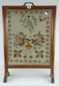 EARLY VICTORIAN WELSH WOOLWORK SAMPLER featuring a perched parrot over roses and flowers and