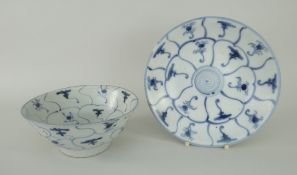TWO TEK SING CARGO ITEMS OF POTTERY both in the blue and white 'Lotus' pattern, dish 8.25cms