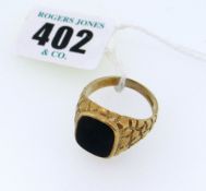 9CT YELLOW GOLD GENTLEMAN'S SIGNET RING having crocodile effect shoulders, 7.6gms