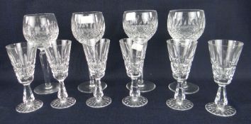 TWO SETS OF WATERFORD CUT-GLASS DRINKING GLASSES comprising set of four tall stemmed wine glasses