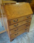 REPRODUCTION WALNUT DROP FRONT BUREAU with four drawers to the base, 99cms high x 74cms wide